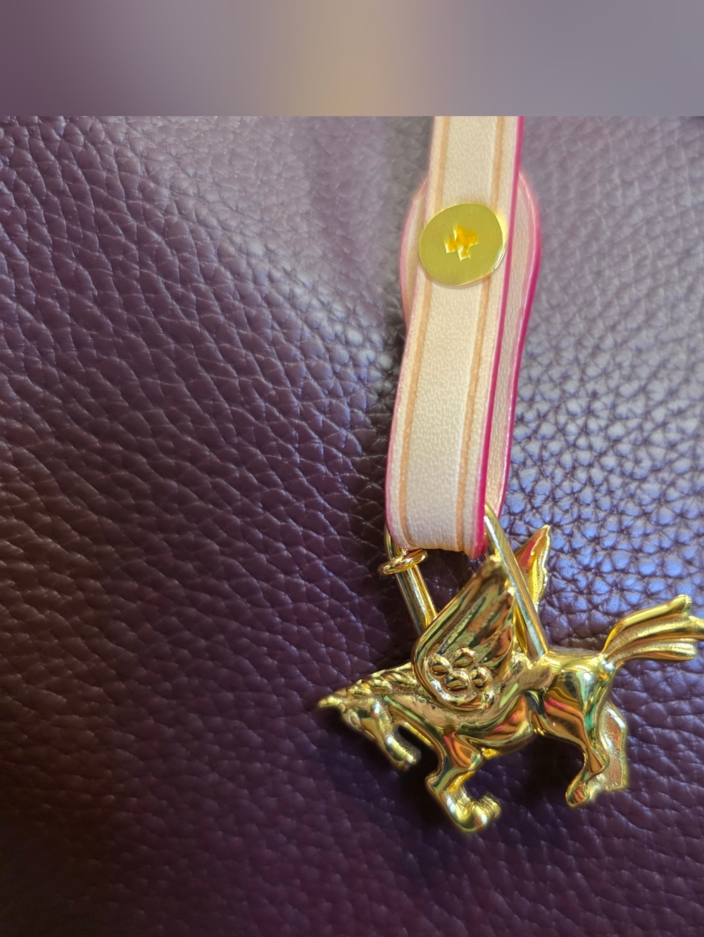 Cadena Gold tone Pegasus horse motif bag charm lock